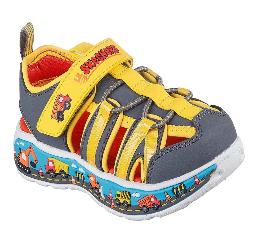 Sandalias niño Skechers modelo Play Scene Splash color marron charcoal y amarillo y estampado de camiones sandalias de la marca Skechers con cierre de tira adherente y elasticos muy comodas y ligeras con sistema easy on off designed in Los Angeles