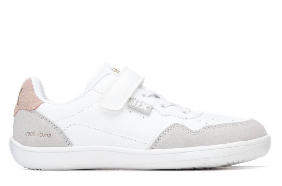 Zapatillas niña barefoot de la marca Xti color blanc0 y rosa sneakers de calzado respetuoso Xti free walking con cierre de tira adherente y elasticos muy comodas y ligeras con certificado Vegano y tecnologia comfort tech y memory foam pro
