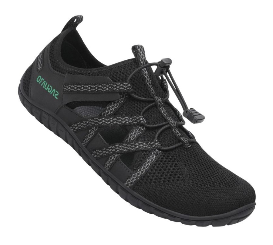 Zapatillas niño o mujer Saguaro Breeze II color negro carpines deportivos abiertos por el lateral barefoot para playa piscina o montaña calzado respetuoso de la marca Saguaro con cierre de elasticos muy comodos