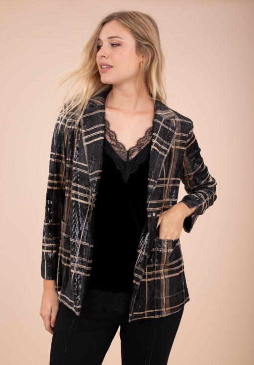 La veste à carreaux et paillettes
