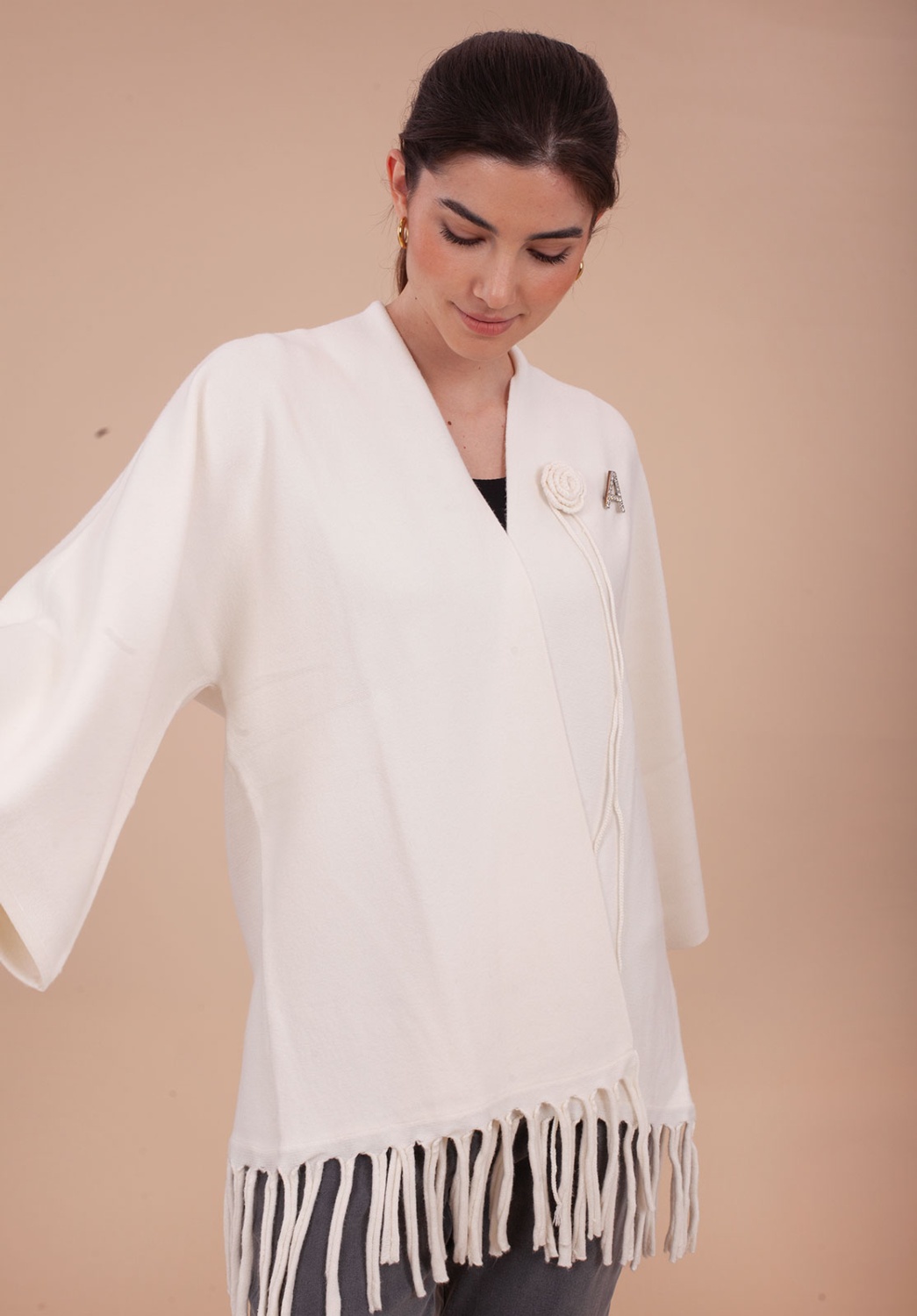 CHAQUETA blanca con flecos