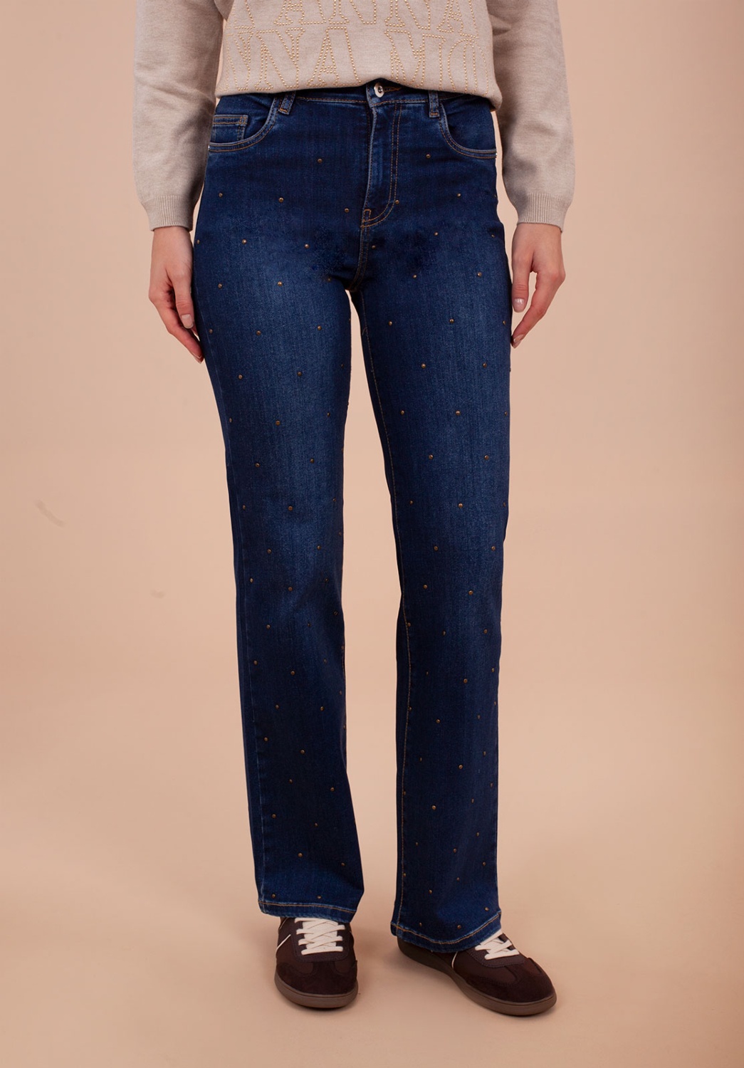 Jeans azul oscuro con aplicaciones metálicas 1