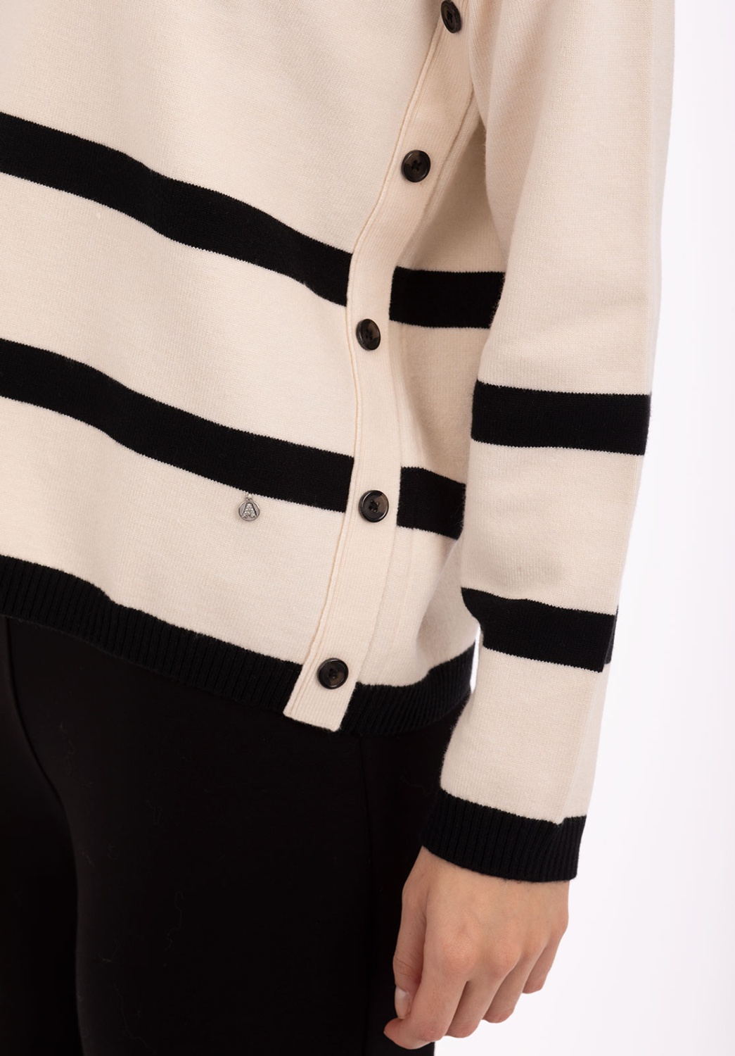 Ecru knit sweater with black stripes