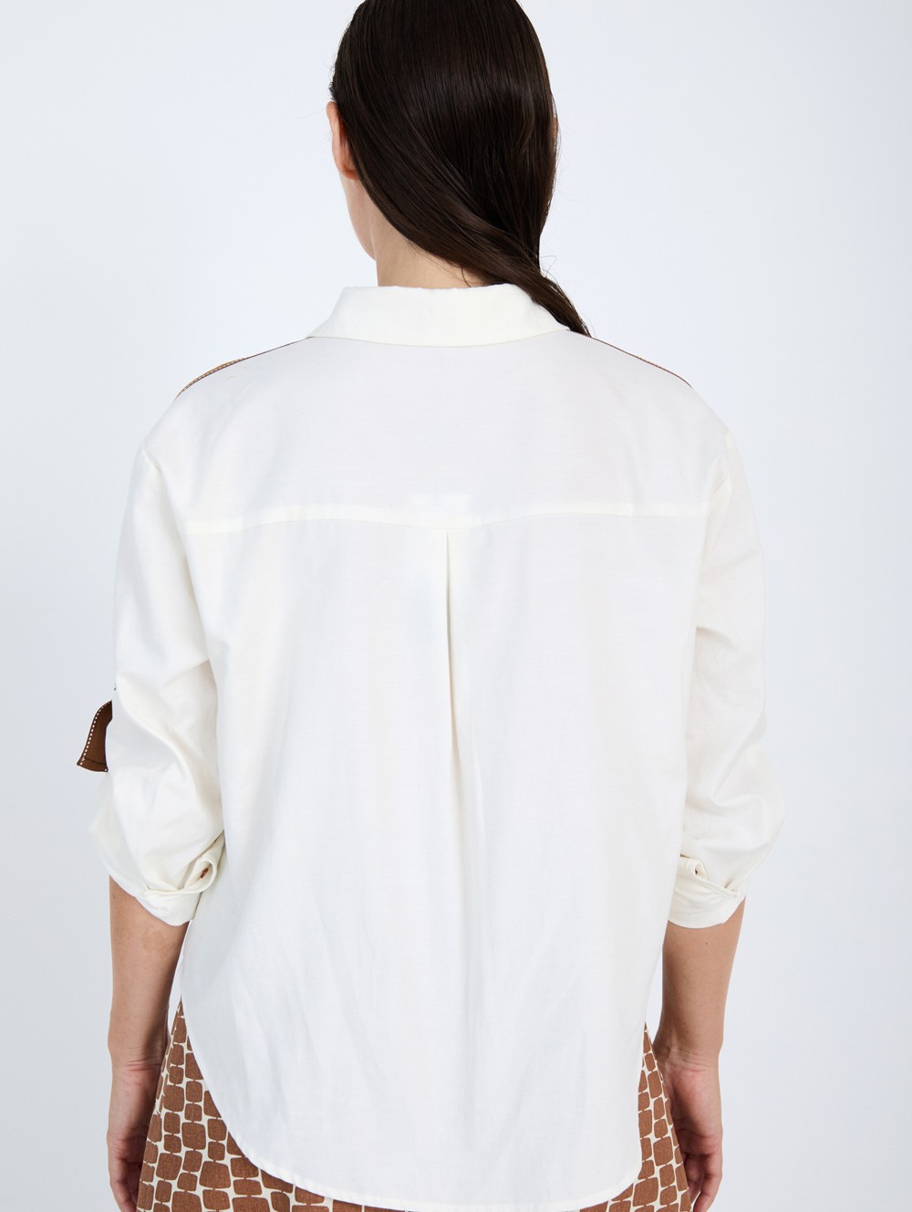 Shirt with cuffed sleeves