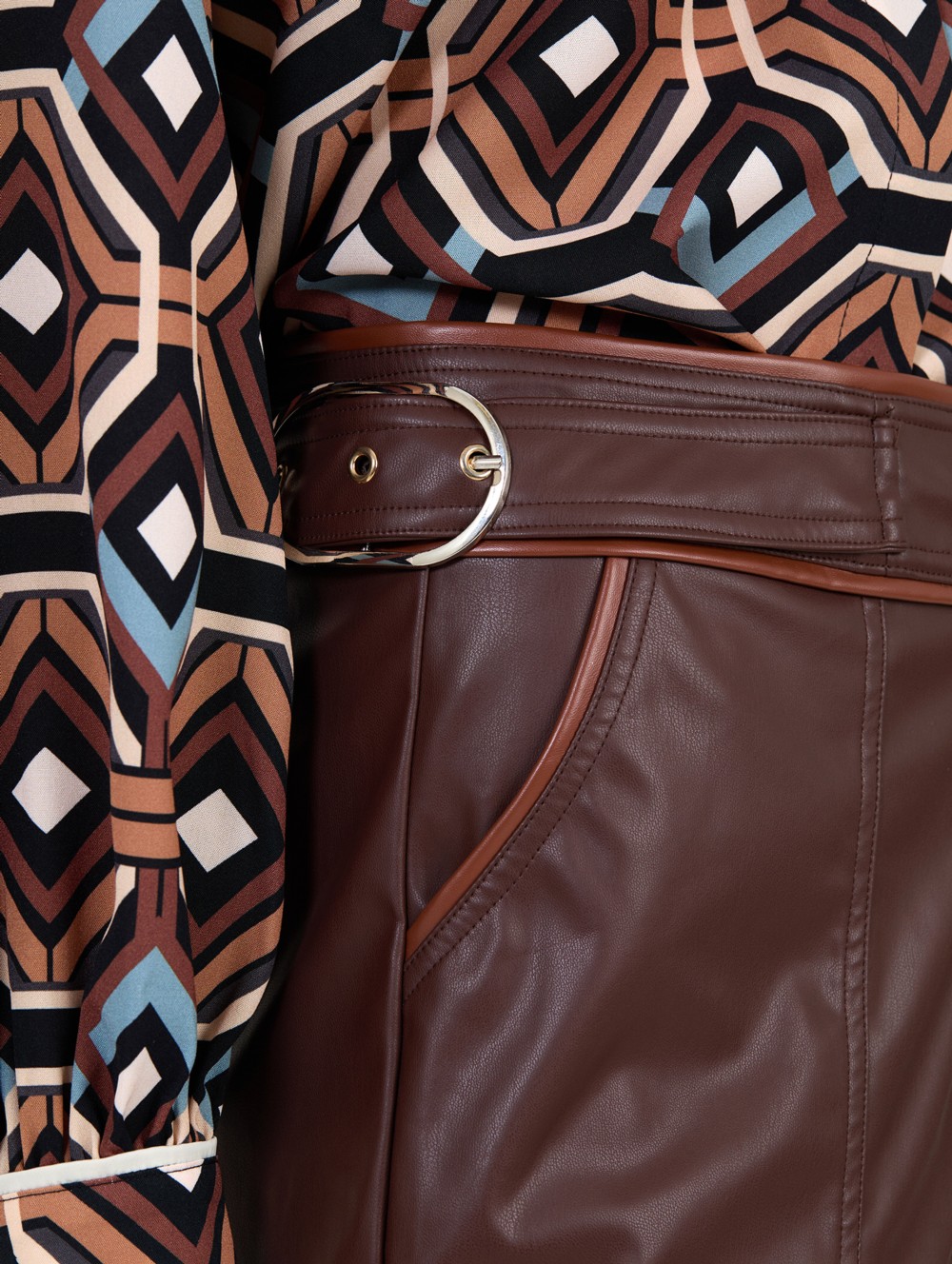 Leatherette trousers with buckles