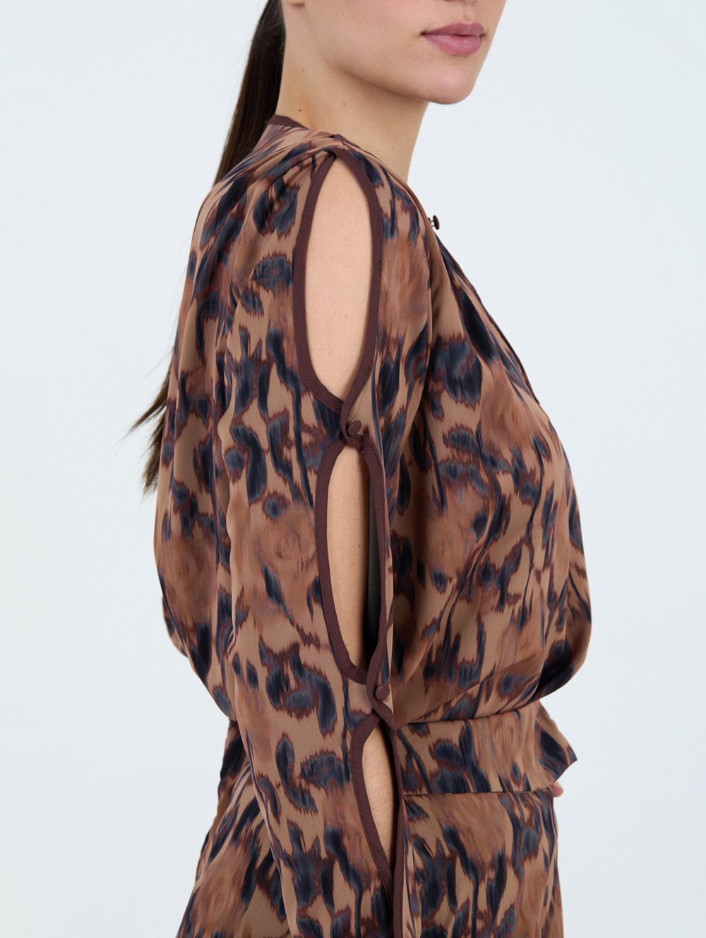 Blouse à manches fendues