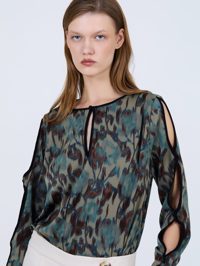 Blusa aberturas manga