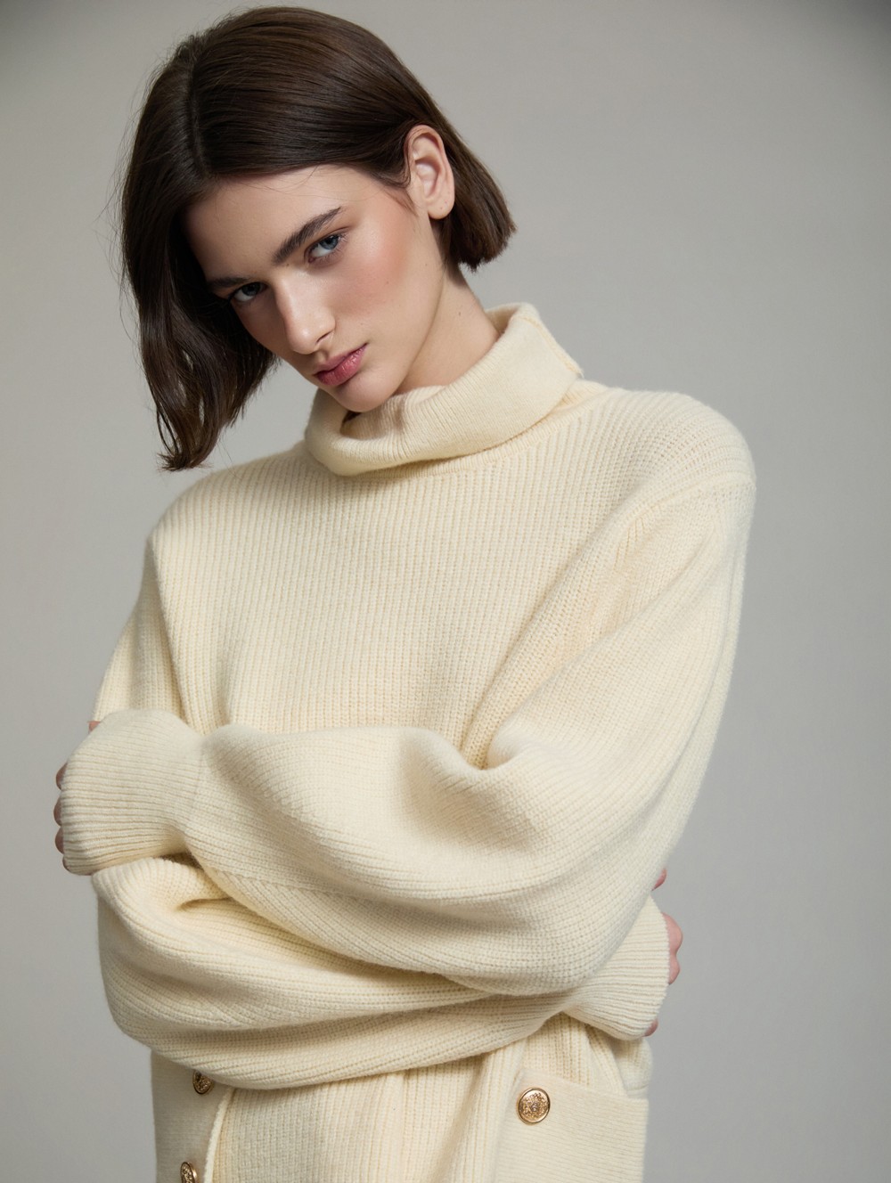 Sweater with side buttons