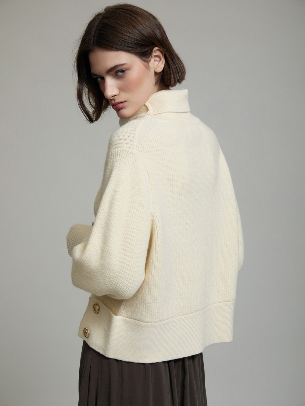 Sweater with side buttons