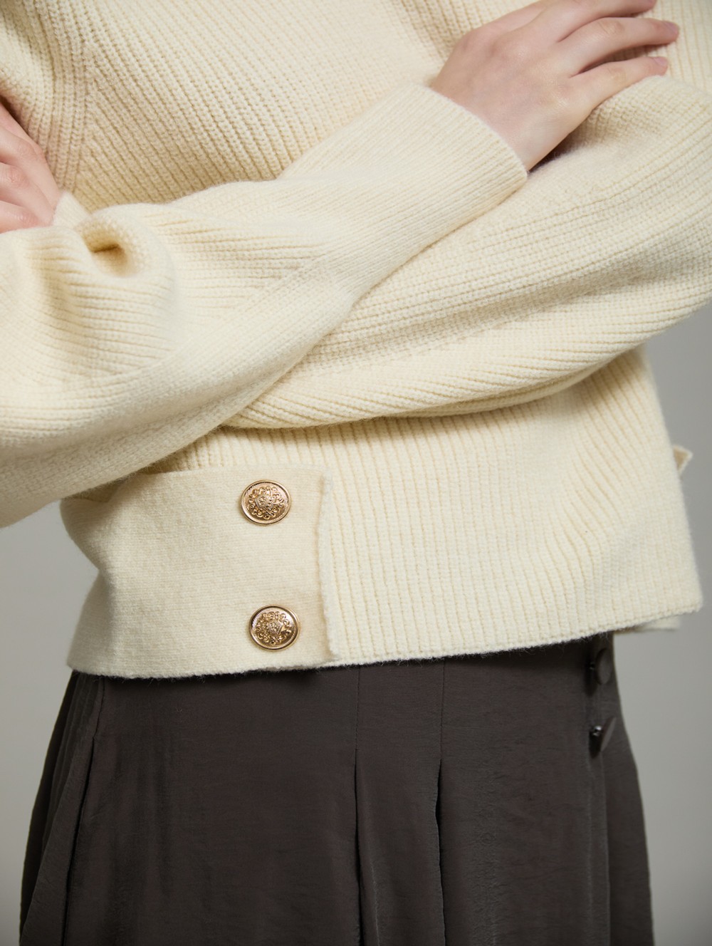 Sweater with side buttons