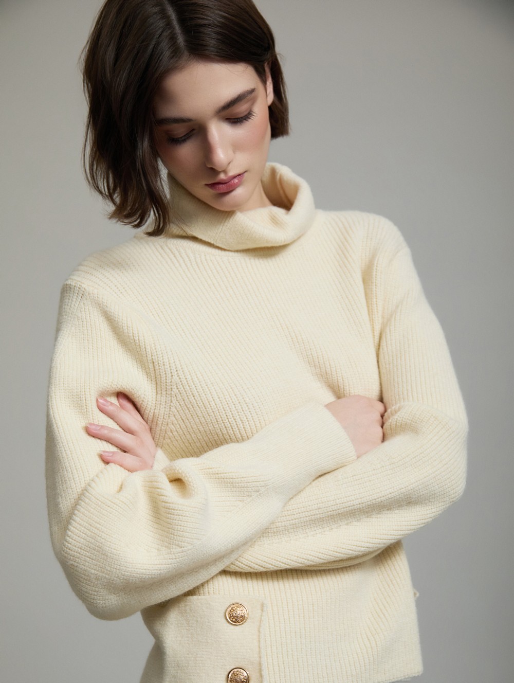 Sweater with side buttons