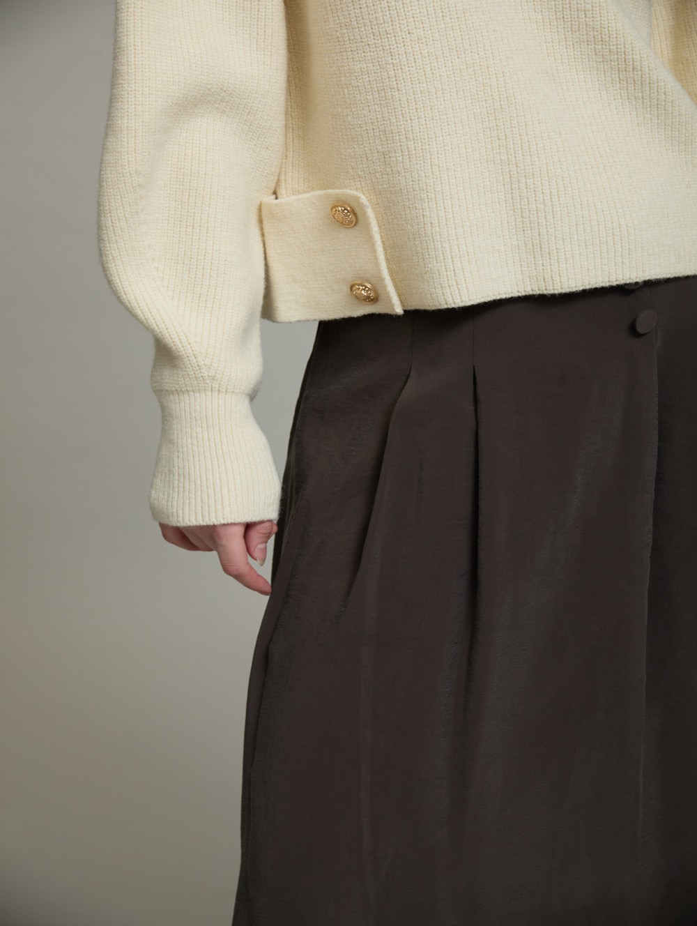 Sweater with side buttons
