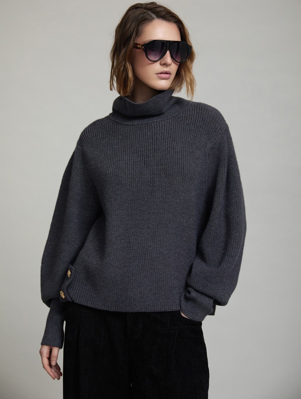 Sweater with side buttons