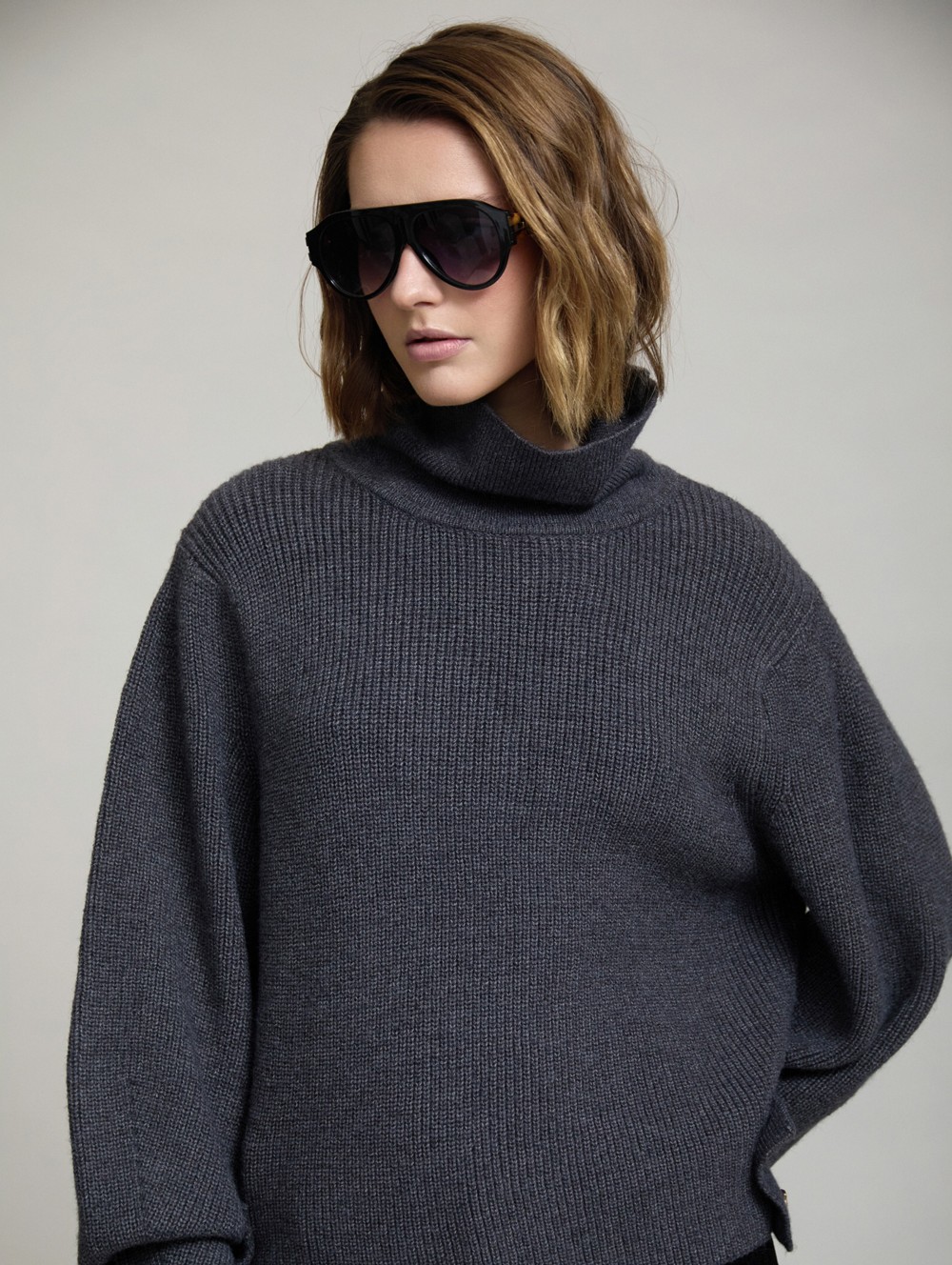 Sweater with side buttons