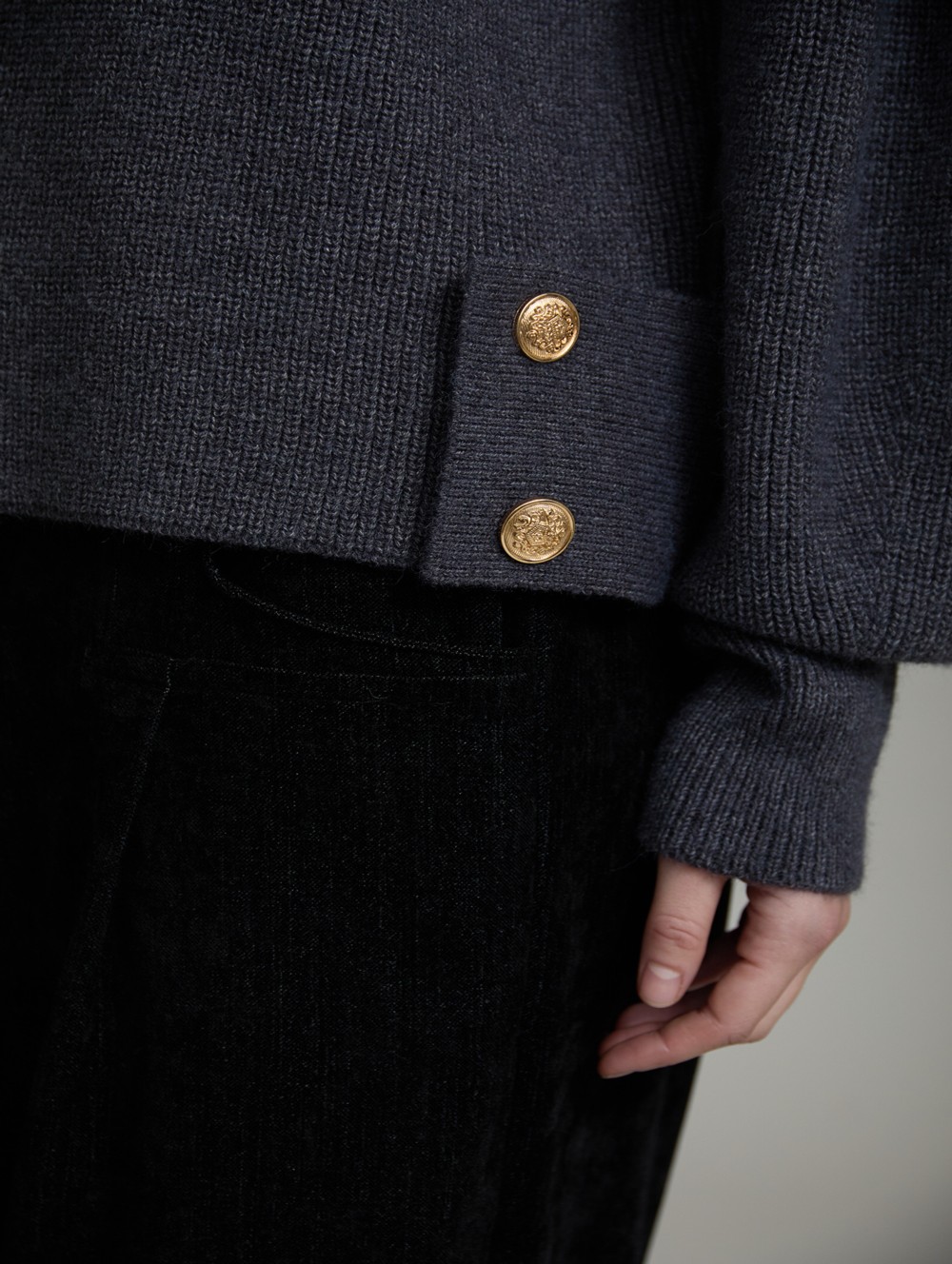 Sweater with side buttons