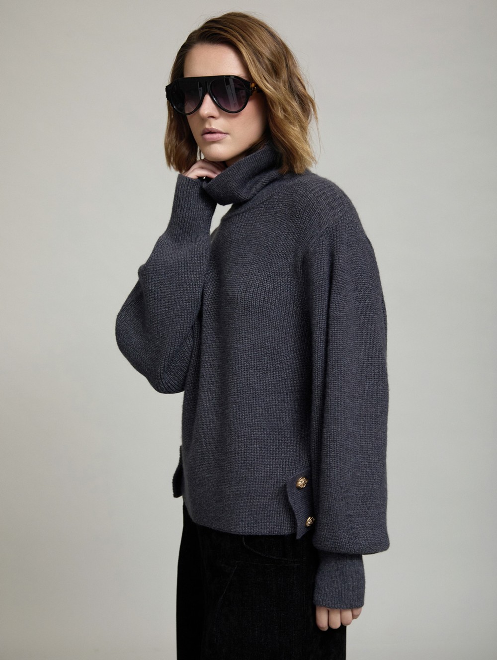 Sweater with side buttons