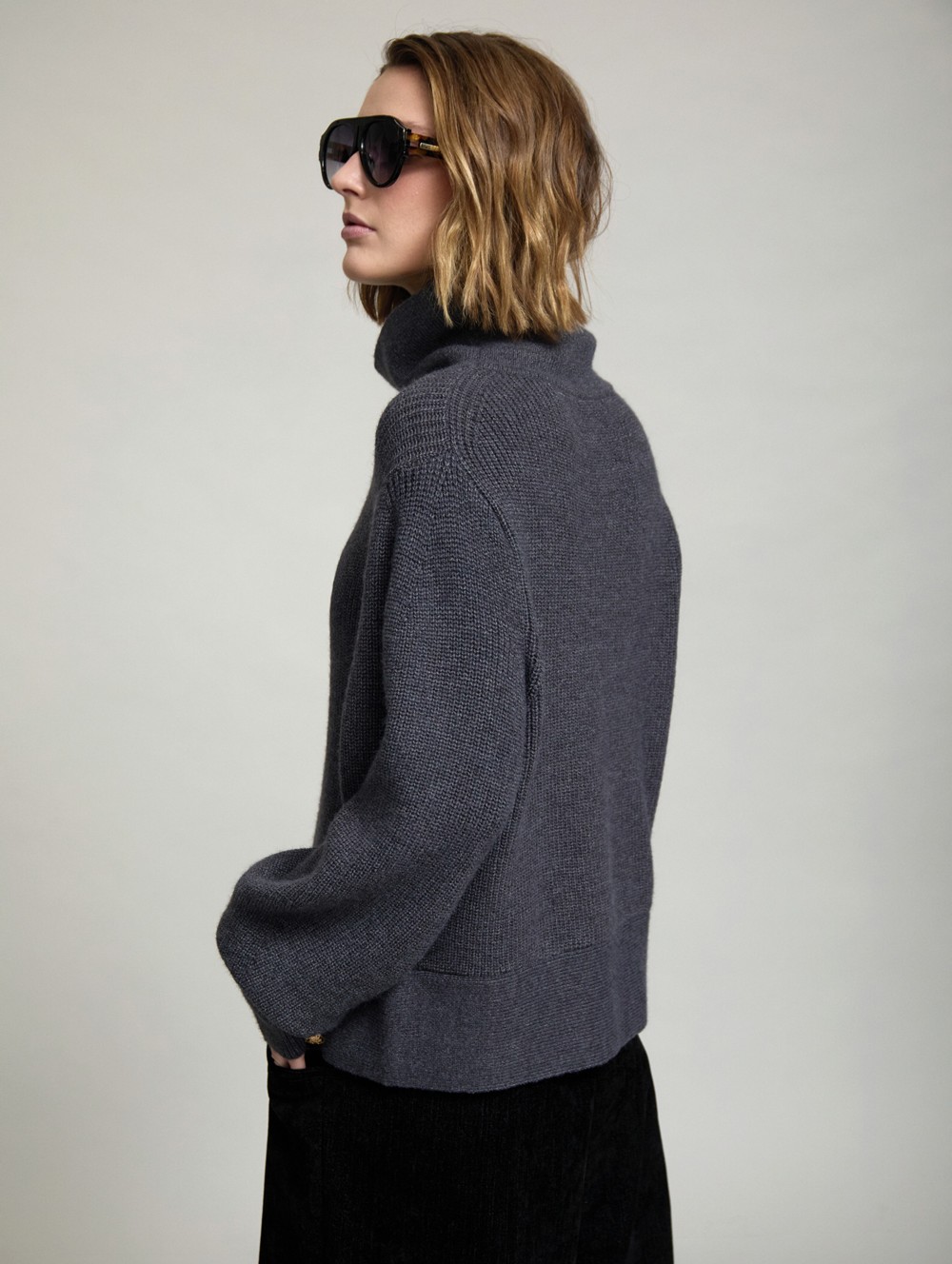 Sweater with side buttons