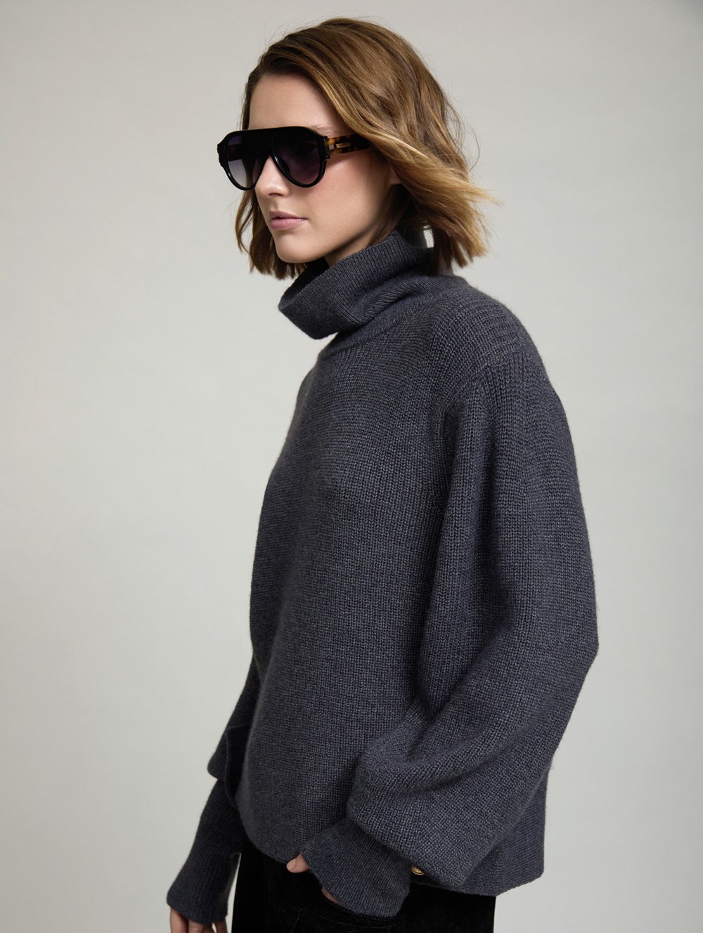 Sweater with side buttons