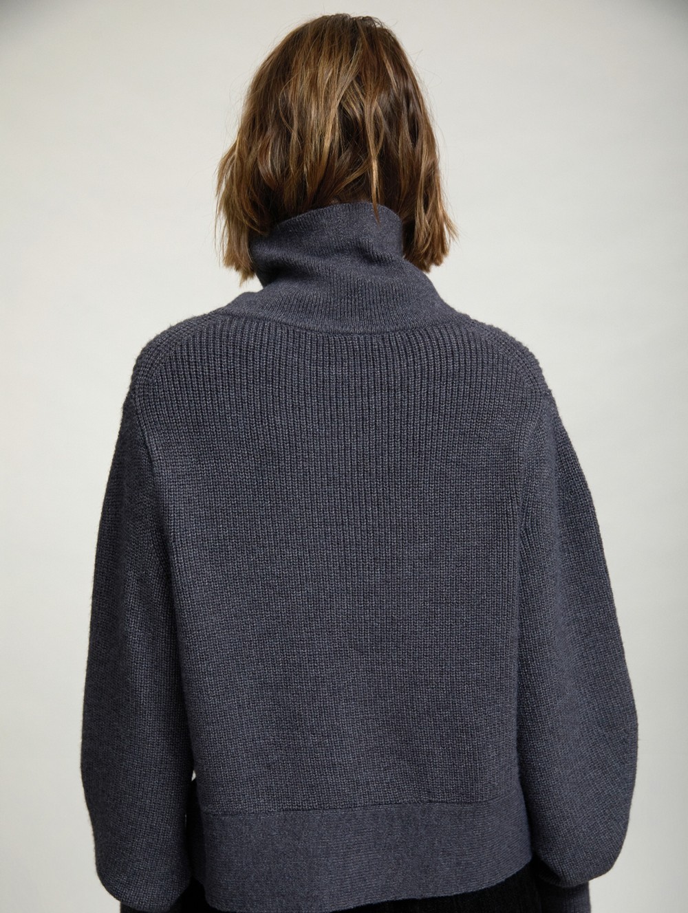 Sweater with side buttons