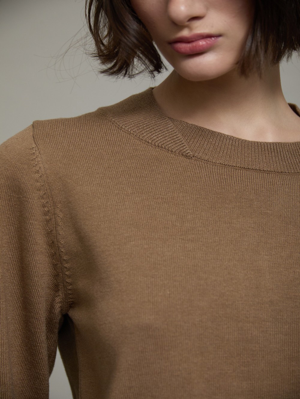 Sweater cuff buttons