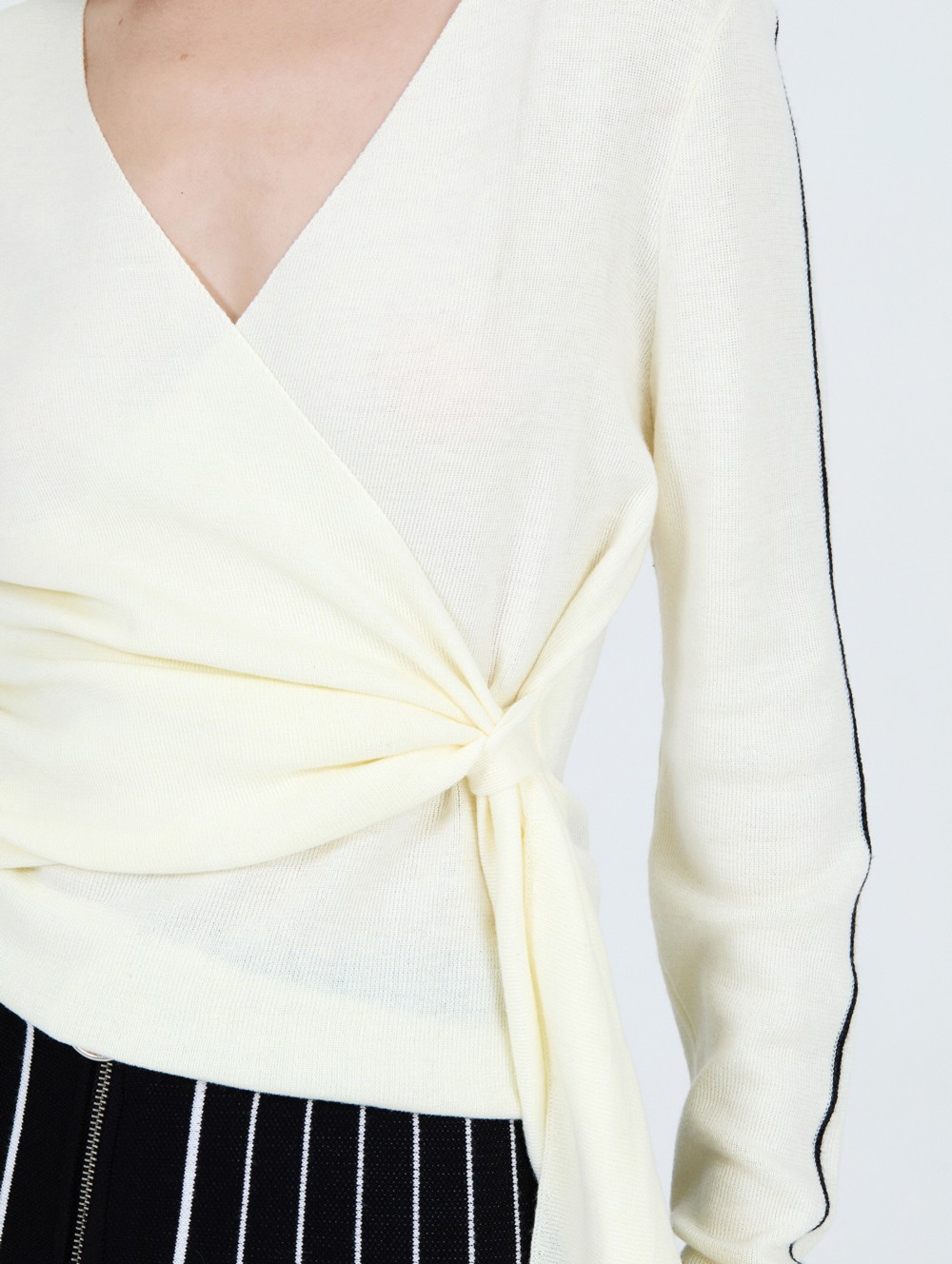 Striped crossover sweater