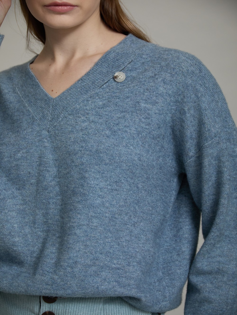 Sweater with faux leather