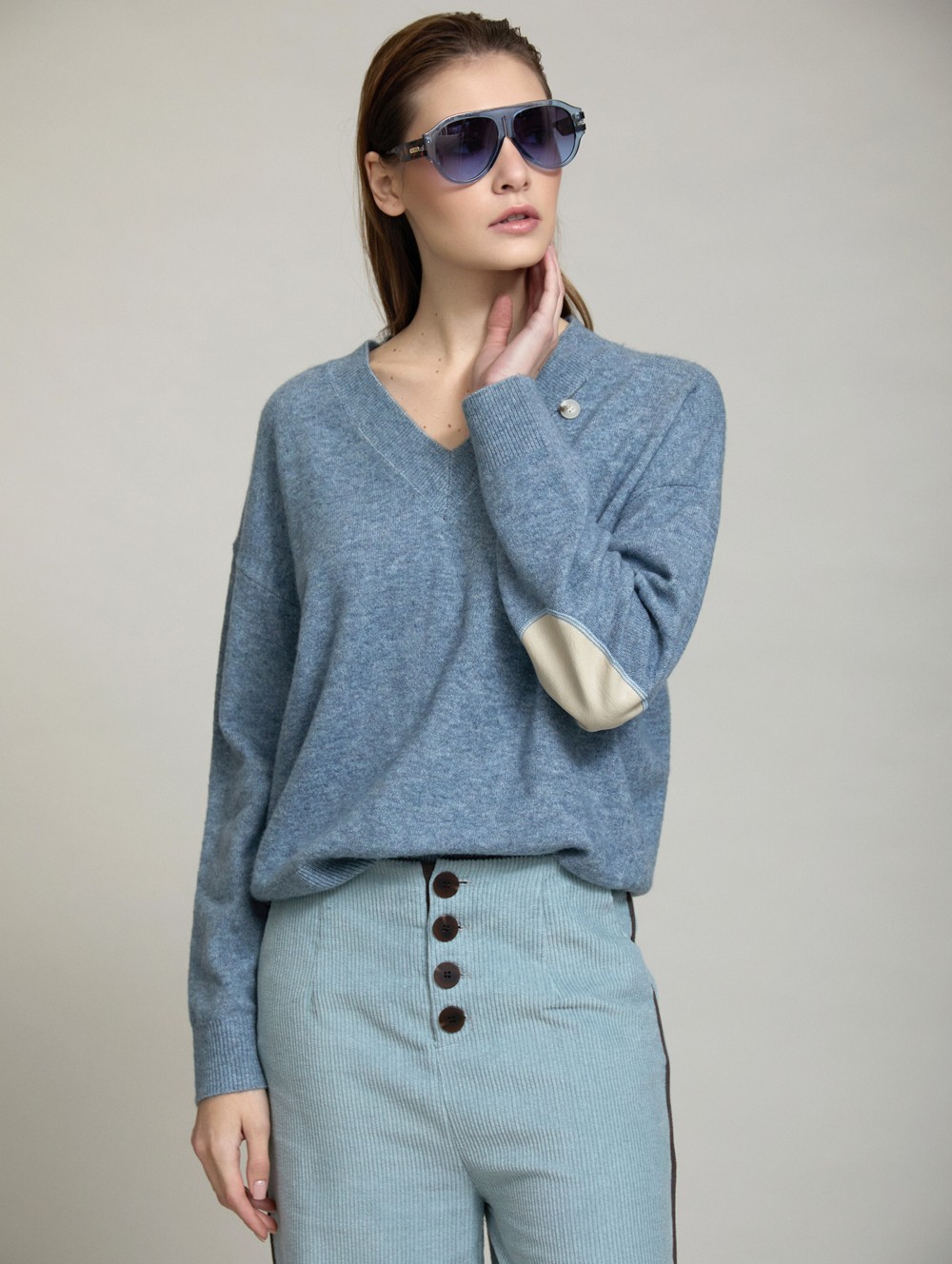 Sweater with faux leather