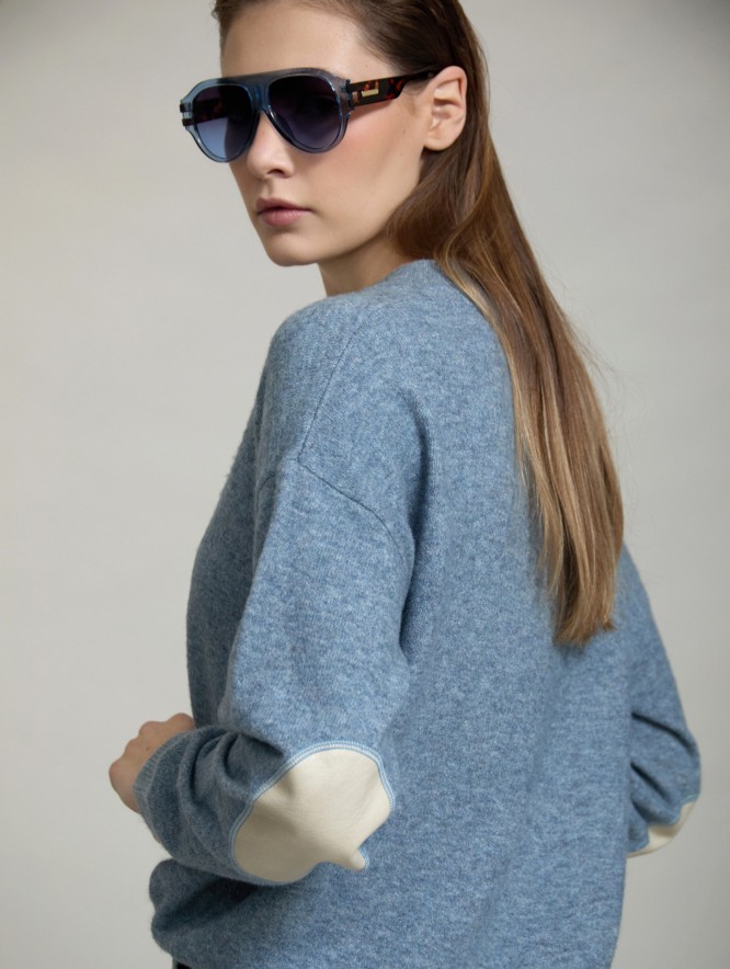 Sweater with faux leather