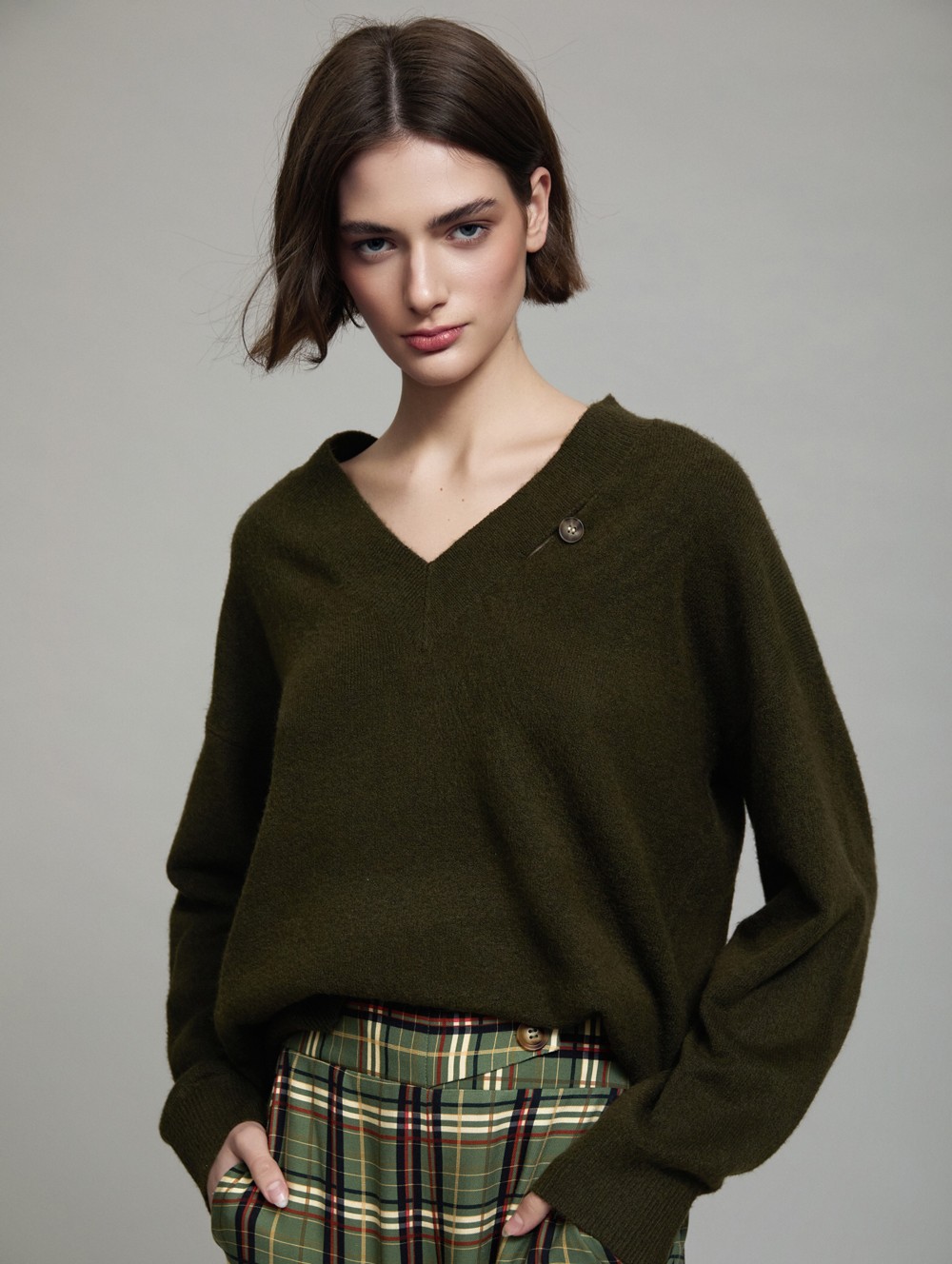Sweater with faux leather