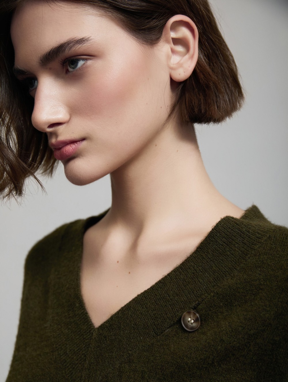 Sweater with faux leather