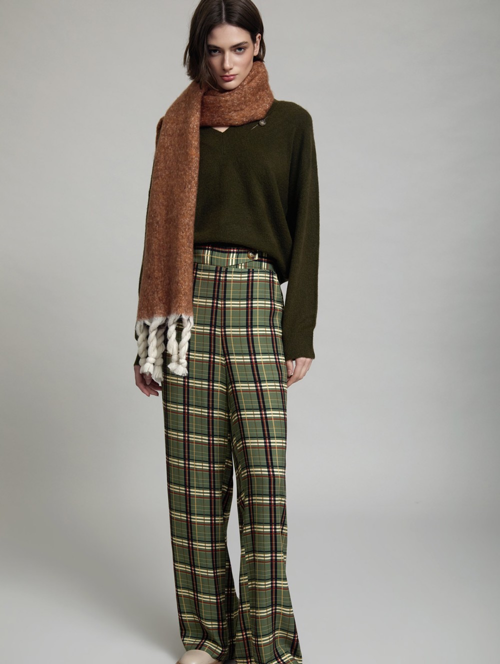 Sweater with faux leather