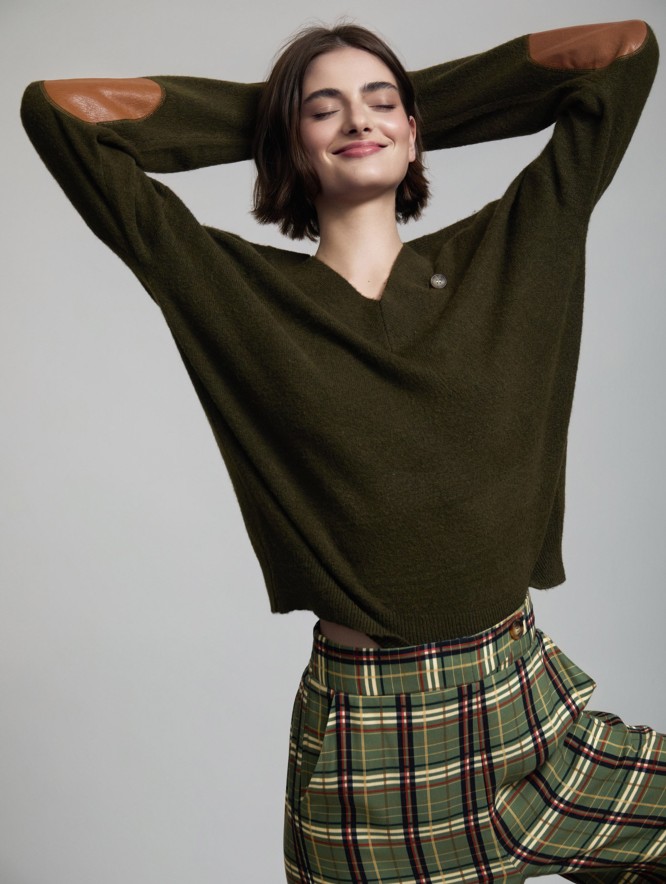 Sweater with faux leather
