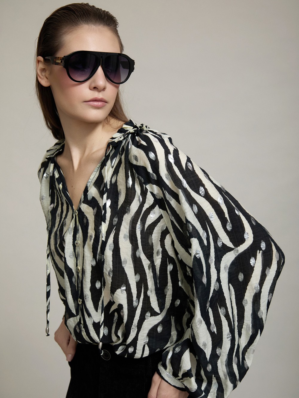 Ruffled neckline printed blouse