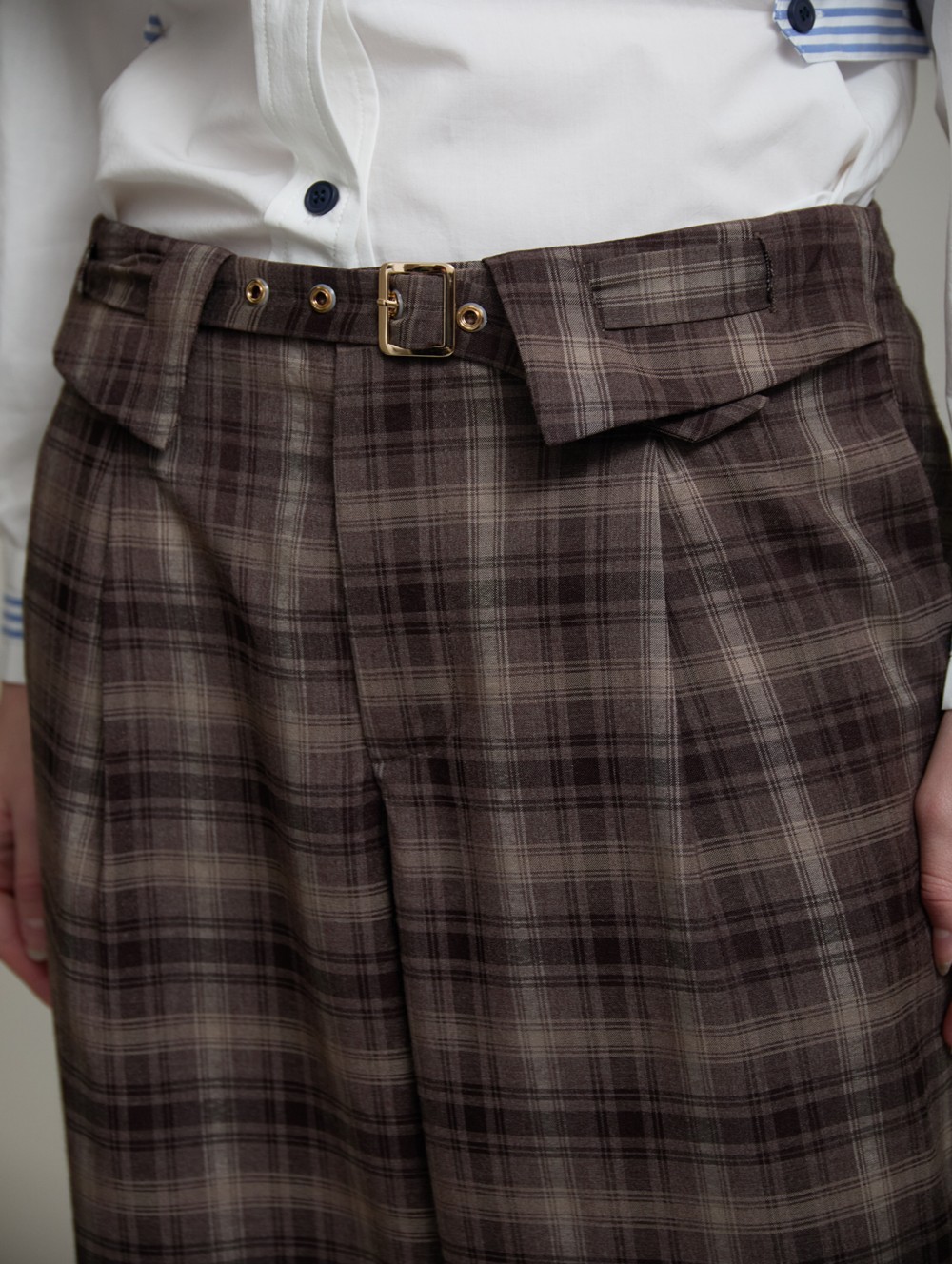 Checked belt-detail trousers