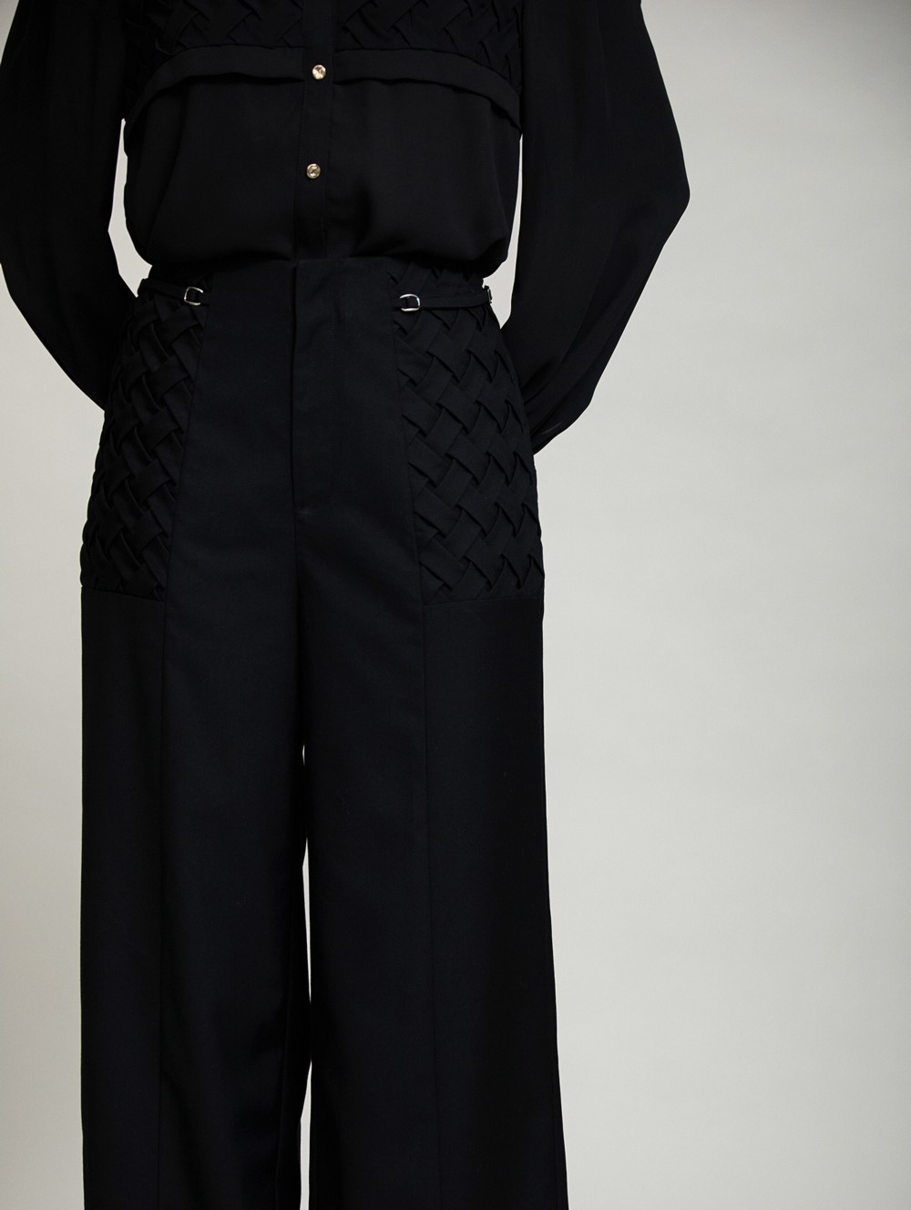 Braided pockets trousers