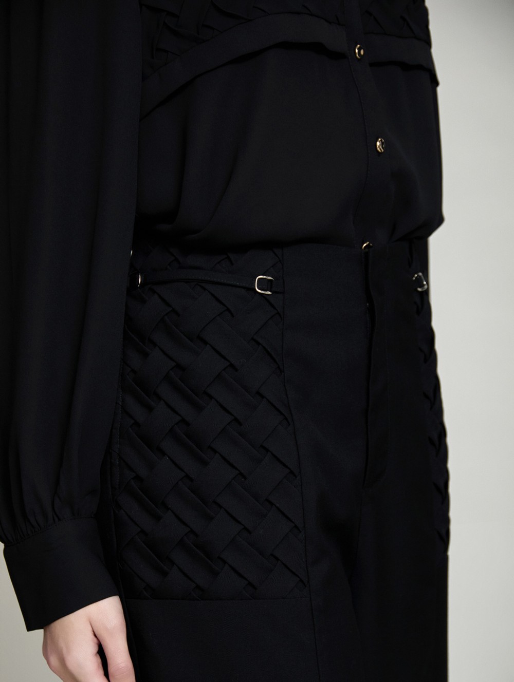 Braided pockets trousers