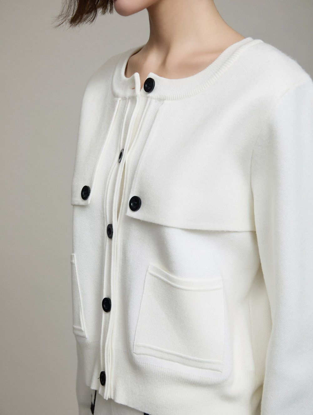 Knit jacket with button contrast