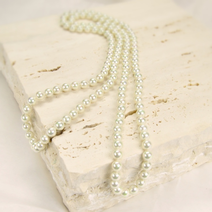 Endless classic 8 mm. pearls necklace.