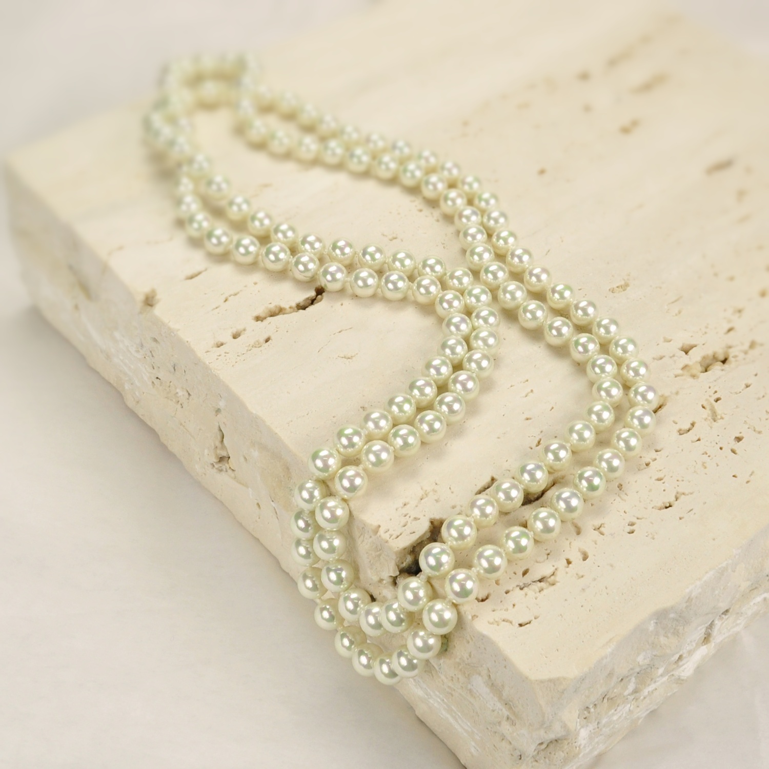 Endless classic 8 mm. pearls necklace.