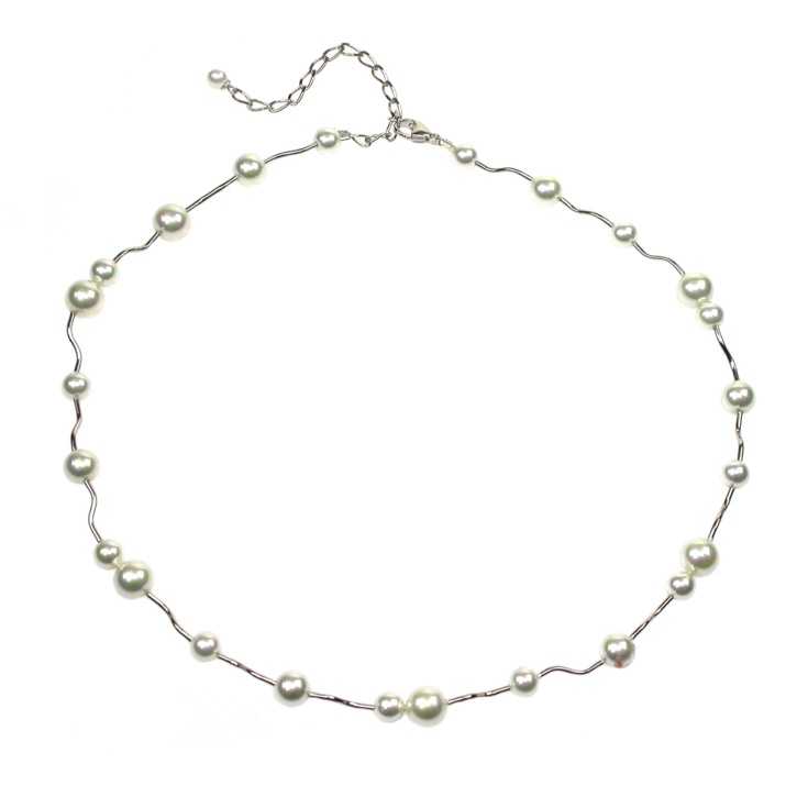 Necklace in White Pearls linked together by Sterling Silver tubes