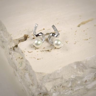 Sterling Silver Earrings with 8 mm. Pearls and Zircons. 1