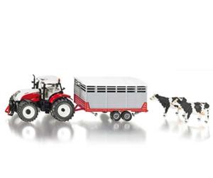 Tractor STEYR con remoque transporte de vacas