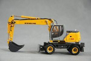 Miniatura excavadora NEW HOLLAND MH 5.6 - Ítem1