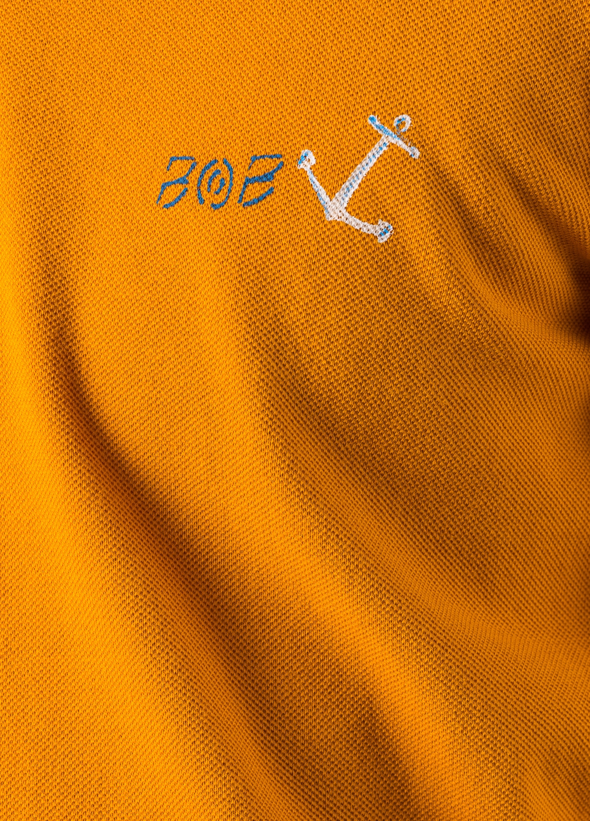Polo BOB manga corta naranja con dibujo en espalda - Ítem6