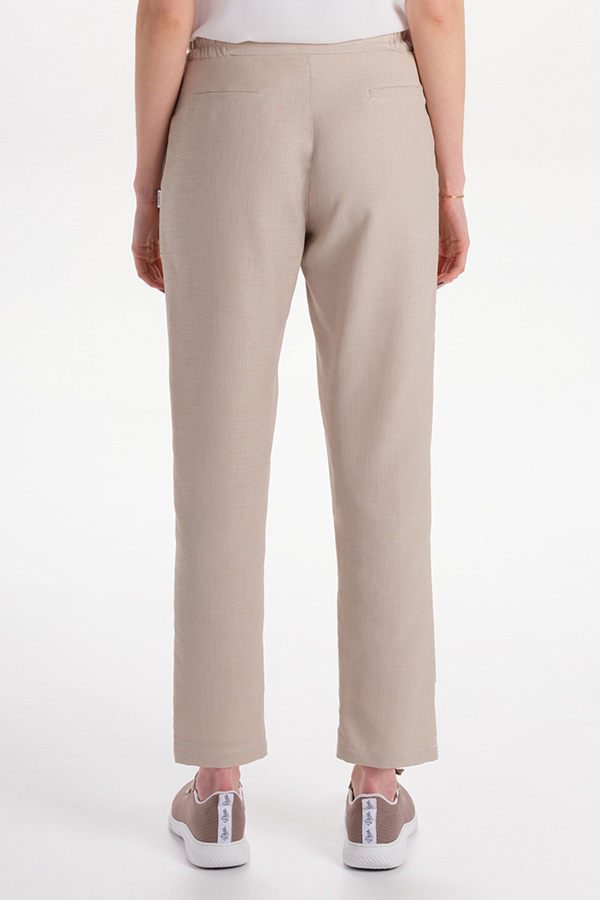 Pantalón unisex beige con cordón 1