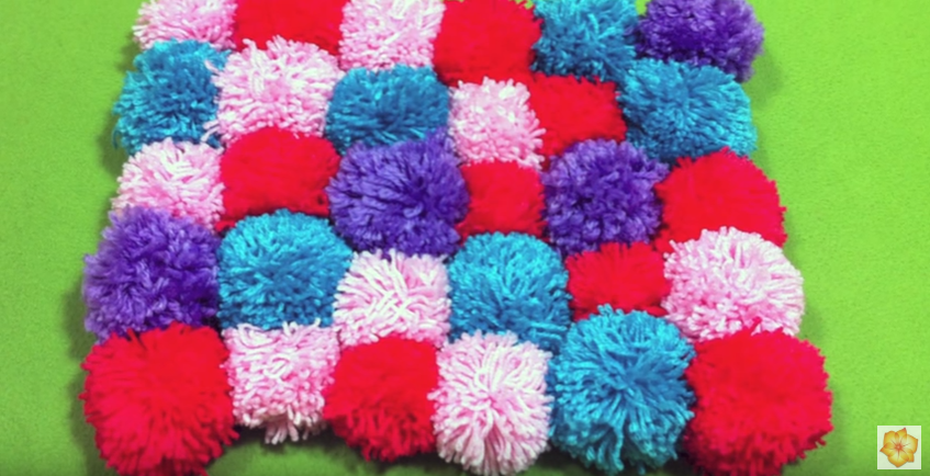 alfombras pompones lana paso a paso