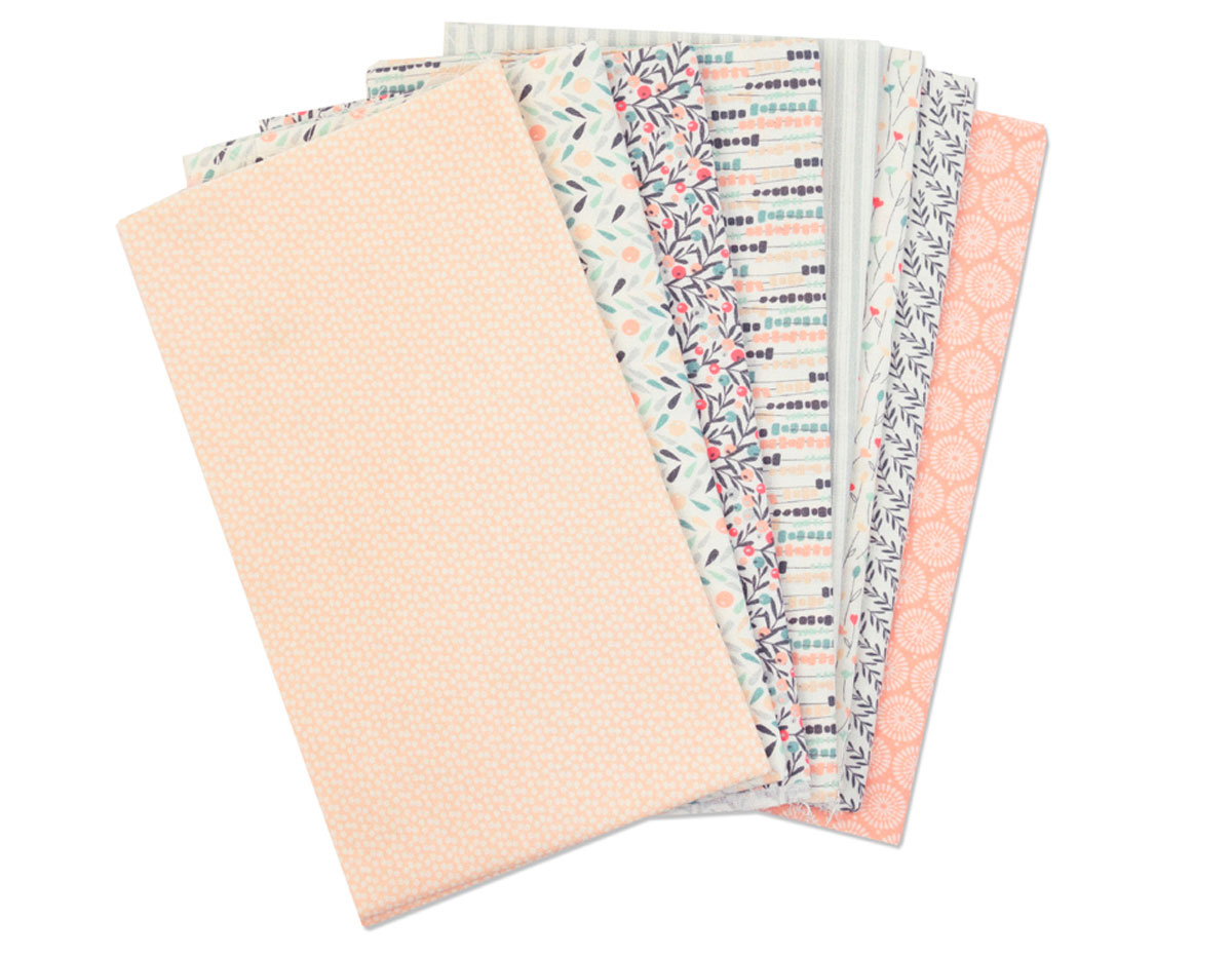 E663011 Set 8 piezas tela algodon disenos surtidos 56cm x 45 5cm Sizzix