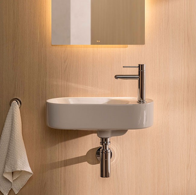 Lavabo asimétrico mural compacto Meridian Roca